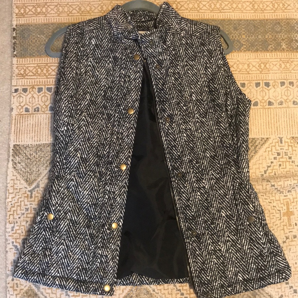 black and white speckled vest